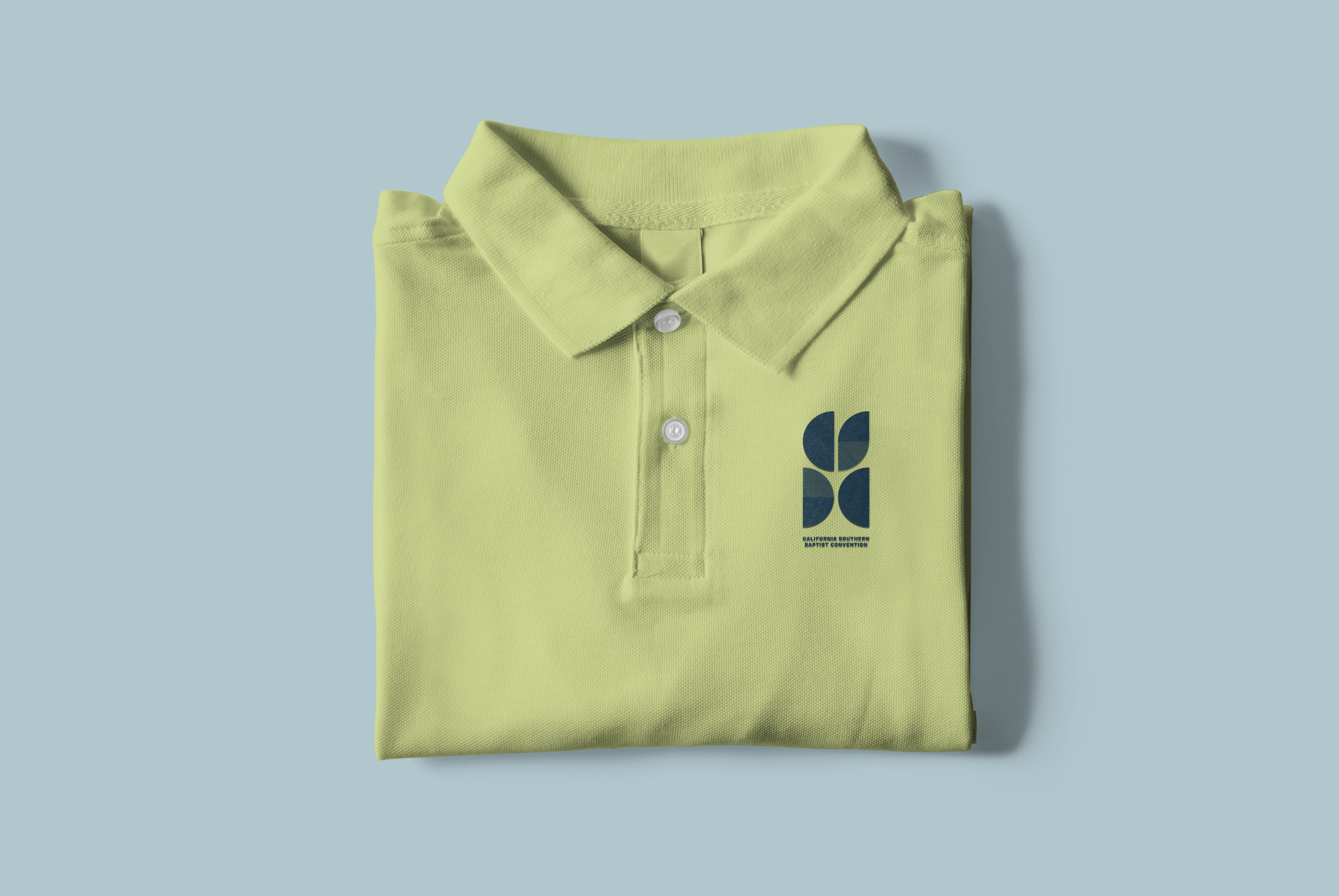 mockup-of-a-folded-polo-shirt-placed-on-a-customizable-surface-3090-el1